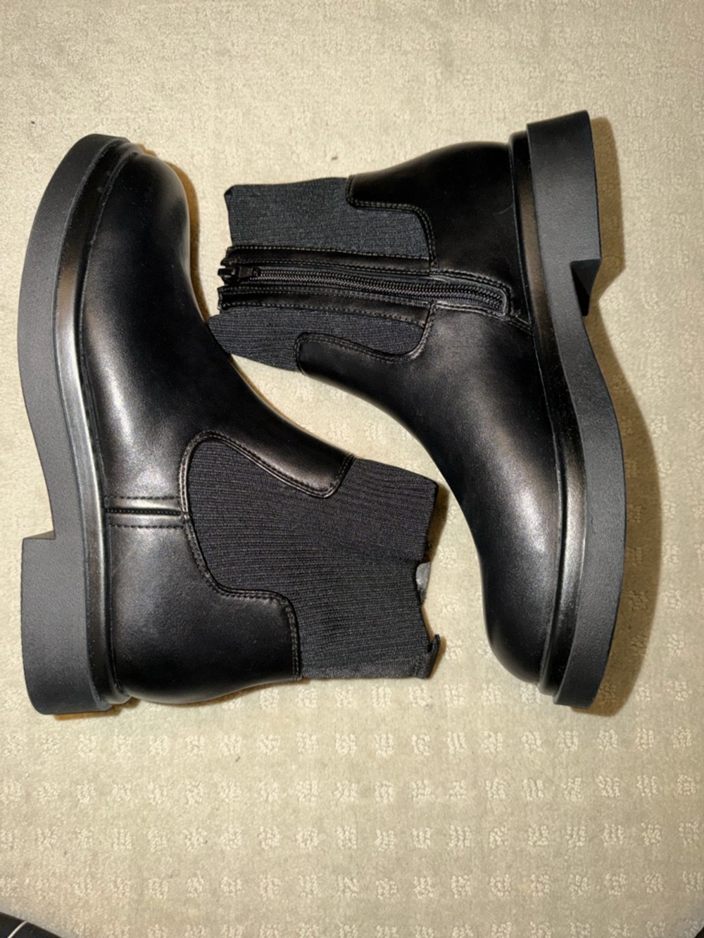 Woman’s Black Zip Chelsea Boots